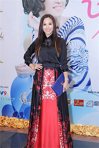 Hoa hậu diện bộ váy hàng hiệu trị giá hơn 140 triệu đồng của nhà thiết kế lừng danh Zuhair Murad đến dự một sự kiện hồi tháng 7/2014. Ảnh: VTC.