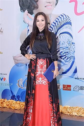 Hoa hậu diện bộ váy hàng hiệu trị giá hơn 140 triệu đồng của nhà thiết kế lừng danh Zuhair Murad đến dự một sự kiện hồi tháng 7/2014. Ảnh: VTC.