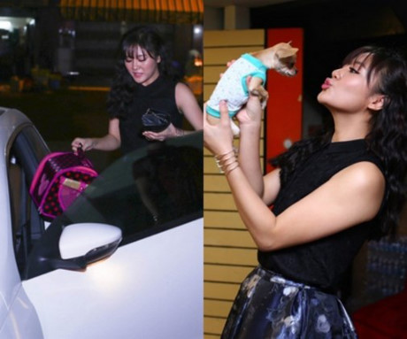 Nữ ca sĩ Văn Mai Hương nuôi một chú cún con rất đáng yêu. Cô thường đưa cún cưng đi chơi với một chiếc giỏ. Ảnh: Infonet.