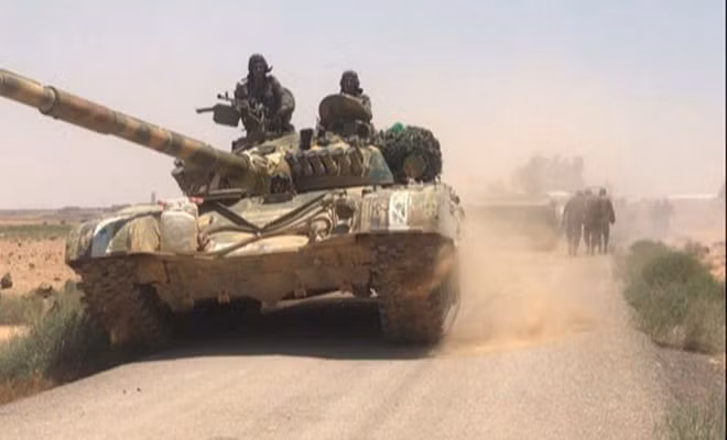 Theo FNA, Quân chính phủ Syria đã đập tan một cuộc phản công của phiến quân IS, buộc bọn chúng phải rút lui sau khi hứng chịu tổn thất nặng nề. Ảnh: SANA.