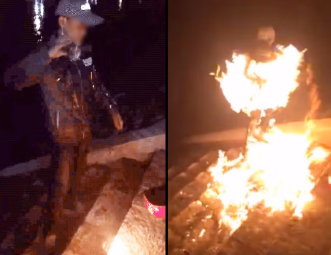 20h ngày 20/9, Tiến đã có mặt ở đúng điểm hẹn trên cầu Tân Hóa và táo bạo thực hiện lời hứa của mình. Nam thanh niên đứng ở chân cầu, tay cầm một chai dung dịch được cho là xăng sau đó trước sự chứng kiến của rất đông người đã tự tưới xăng từ cổ, ngực xuống chân sau đó dùng diêm châm lửa và nhanh chóng nhảy xuống kênh. Hành động của nam thanh niên khiến rất nhiều người chứng kiến kinh ngạc, sửng sốt và châm ngòi cho rất nhiều cuộc tranh cãi sau đó. Sự việc thu hút nhiều người dân địa phương đến khu vực cầu Tân Hóa xem, gây ra cảnh tắc nghẽn trong nhiều giờ. Sau đó các cơ quan chức năng cũng đã phải vào việc tìm hiểu sự việc, nam thanh niên trong ảnh cũng bị tạm giữ để điều tra.