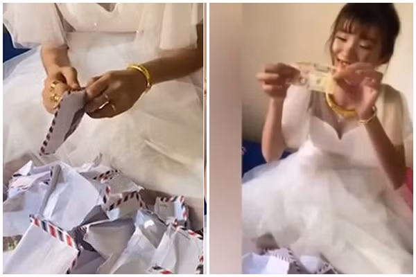 Không ít cư dân mạng đã để lại bình luận, có người cảm thấy thích thú với món quà cưới "bá đạo" này, bên cạnh đó lại có người cảm thấy thương cho cô dâu khi phải bóc phong bì đến...mỏi cả tay.