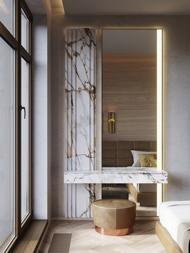 Bàn trang điểm bằng đá cẩm thạch đi kèm ghế màu nâu.