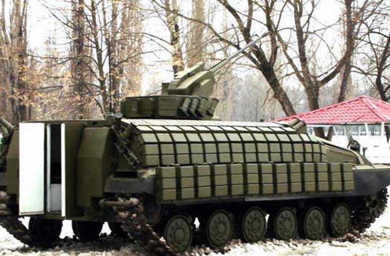 Phần thân xe được giữ nguyên như T-64 gốc, bổ sung thêm giáp phản ứng nổ Nozh và hệ thống phòng vệ chủ động Zaslon tăng khả năng chống mìn, đạn diệt tăng. Vũ khí có một đại liên 12,7mm điều khiển từ xa hoặc tùy chọn pháo 30mm cùng đại liên 7,62mm.