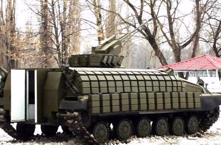 Phần thân xe được giữ nguyên như T-64 gốc, bổ sung thêm giáp phản ứng nổ Nozh và hệ thống phòng vệ chủ động Zaslon tăng khả năng chống mìn, đạn diệt tăng. Vũ khí có một đại liên 12,7mm điều khiển từ xa hoặc tùy chọn pháo 30mm cùng đại liên 7,62mm.