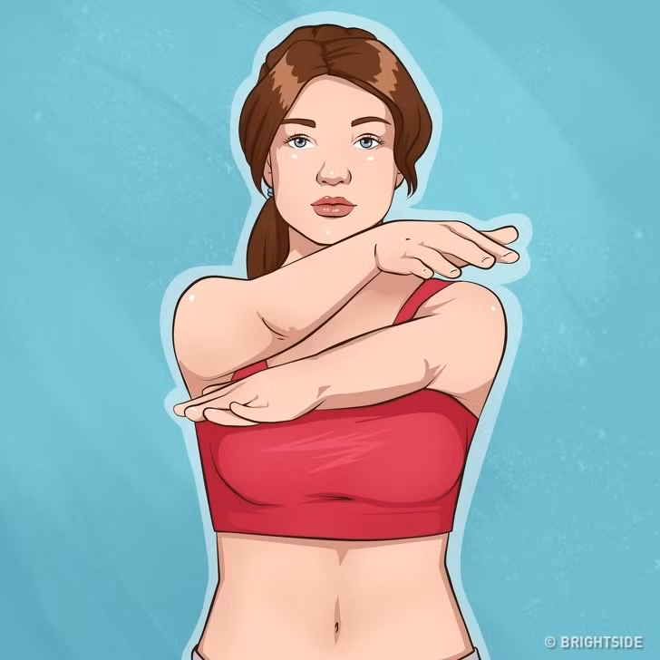 5. Tư thế cái kéo: Động tác này sẽ giúp kéo căng cơ ngực để vòng một săn chắc và điều chỉnh tư thế. Đứng thẳng và thư giãn vai. Duỗi hai tay sang một bên, giữ lòng bàn tay xuống. Sau đó, vắt tay chồng chéo lên nhau. Đổi tay khi làm lặp lại.