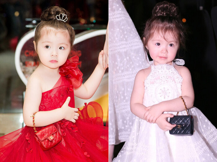 Cadie Mộc Trà - con gái của Elly Trần dùng hai chiếc túi mini đắt đỏ để mix cùng váy bồng công chúa. Cách đeo túi ngay tay cũng vô cùng "điệu", như một fashionista nhí.