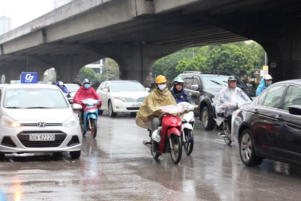 Nguoi Ha Noi trum ao mua, co ro trong dot ret dam dau mua-Hinh-7