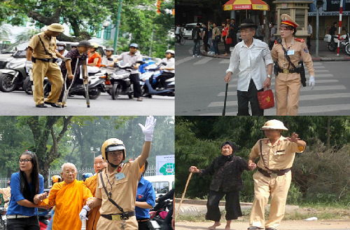 Hình ảnh những người chiến sĩ cảnh sát giao thông giúp người dân qua đường