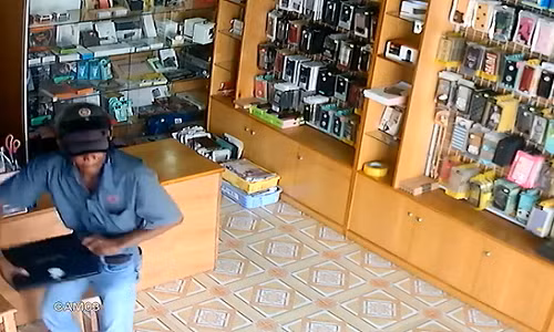 Trom dot nhap vao cua hang, trom laptop nhanh nhu chop