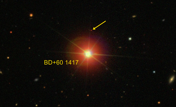 W1243 là một vật thể đồng hành quay quanh một ngôi sao trẻ kiểu K0 tên BD+60 1417. W1243 quay rất xa ngôi sao mẹ của nó, cách khoảng 1.662 lần so với khoảng cách giữa Trái Đất và Mặt Trời, mang những dấu hiệu gợi ý rằng nó là một hành tinh.