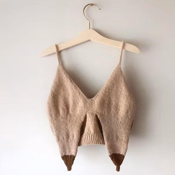 Từ bầu ngực căng tràn, vòng 1 của bà mẹ này chảy xệ theo thời gian.