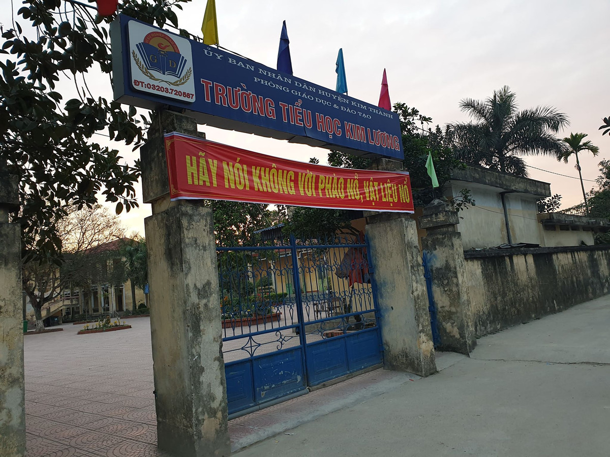 Con đường an toàn dẫn từ nghĩa trang liệt sĩ qua trường tiểu học Kim Lương.