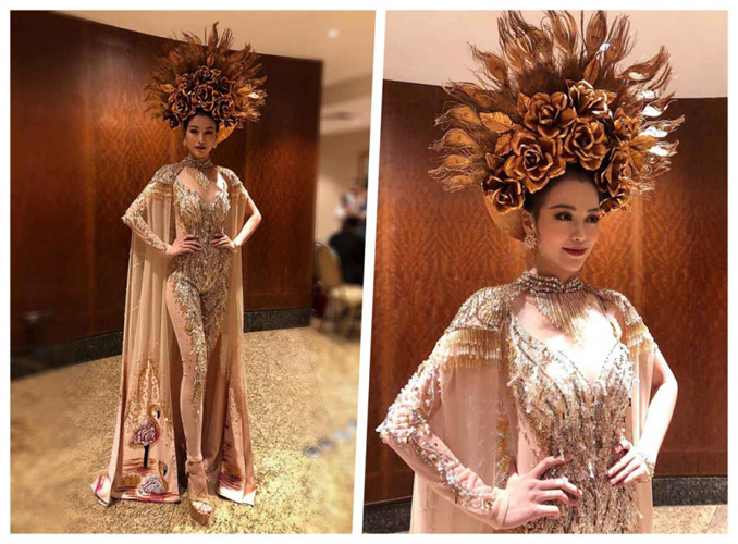 Trước đó cũng trong cuộc thi, Phương Khánh đã chiến thắng hạng mục Trang phục dân tộc đẹp nhất khu vực Châu Á - Thái Bình Dương. Bộ quốc phục này được lấy cảm hứng từ vị thần mặt trời, chiếc áo choàng của các vị nữ tướng Việt Nam và mấn được làm tỉ mỉ công phu. Ảnh: Zing.