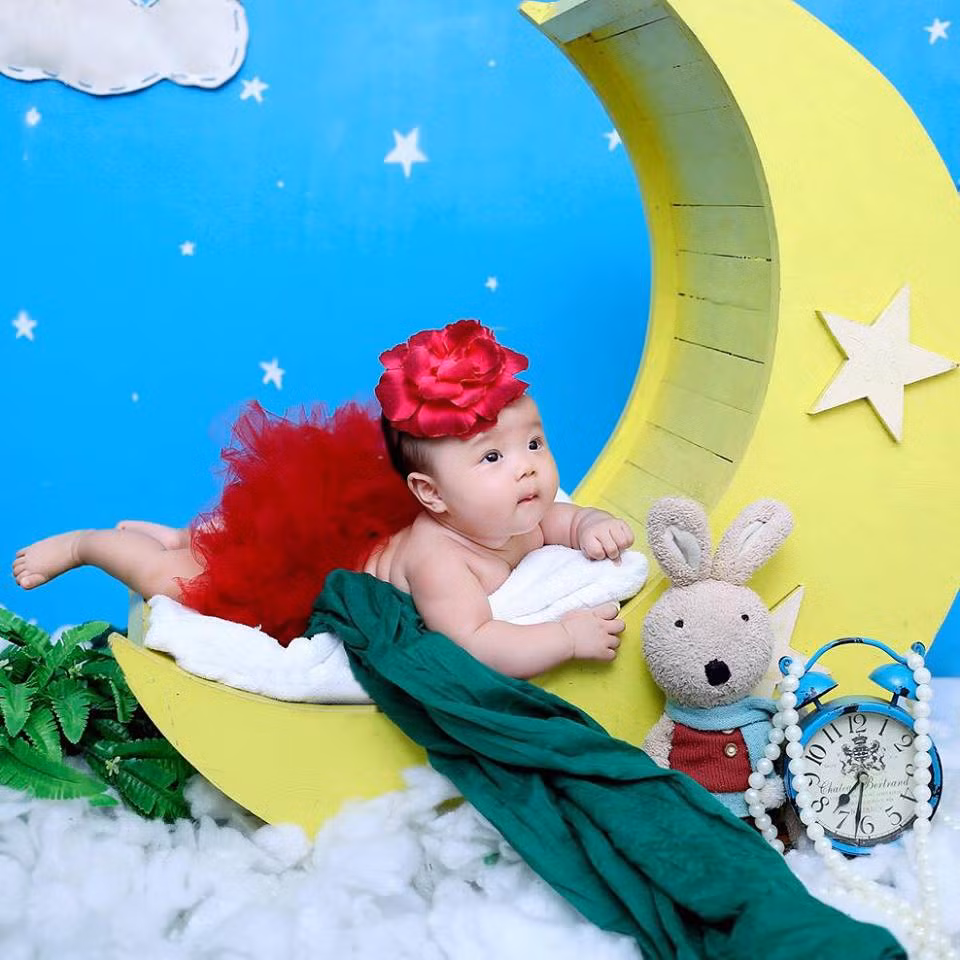 Em bé bụ bẫm và có những biểu cảm rất đáng yêu.