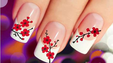 Nail bóng họa tiết cành đào đỏ cực xinh để đi chơi tết.