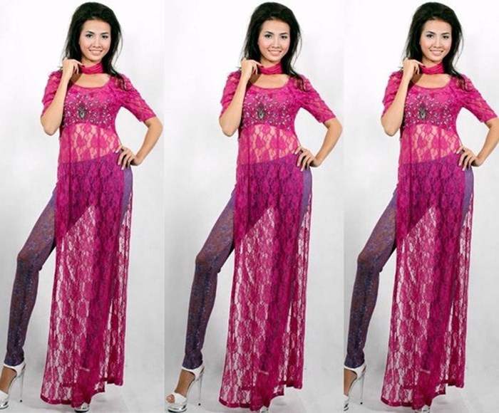 Người đẹp Phan Thị Mơ mang áo dài ren màu mè khó hiểu đi dự thi sắc đẹp quốc tế.