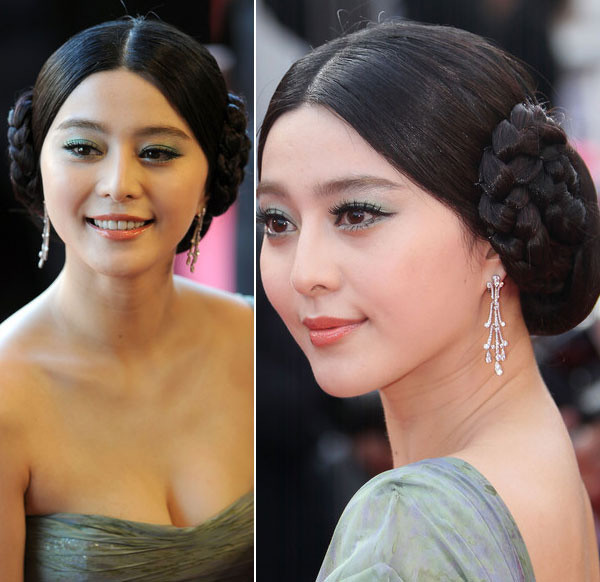 Việc sáng tạo kiểu tóc hai búi với phần tóc mái rẽ ngôi đã làm cho người đẹp bị già đi hàng chục tuổi.