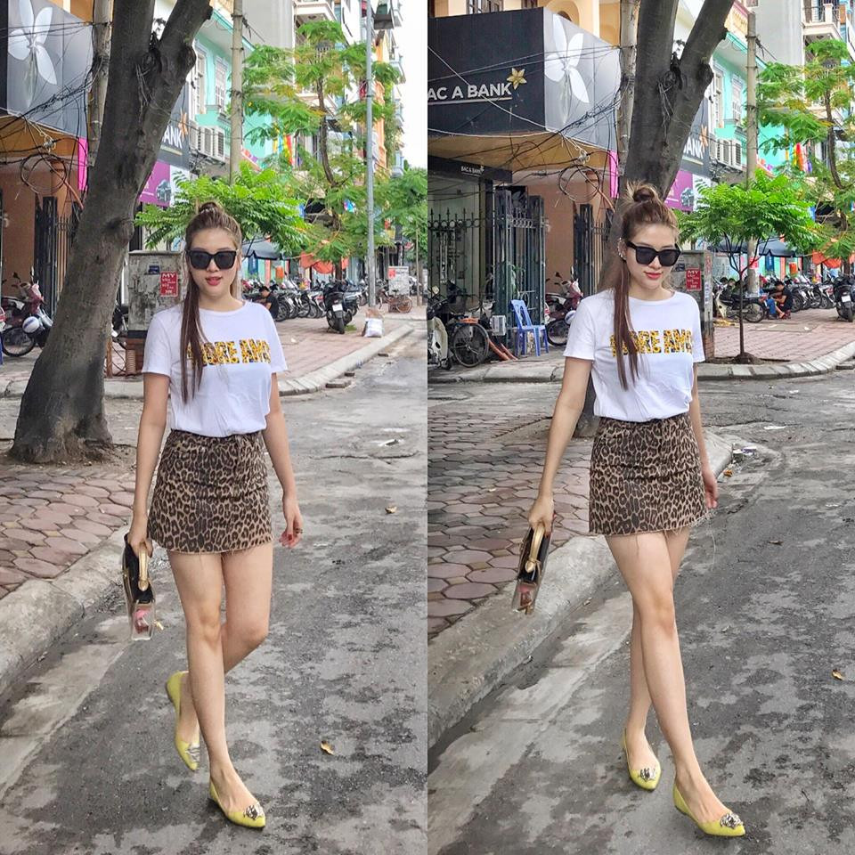 Thời trang xuống phố của Phan Hoàng Thu khá đơn giản nhưng không kém phần sexy với áo phông và chân váy ngắn.