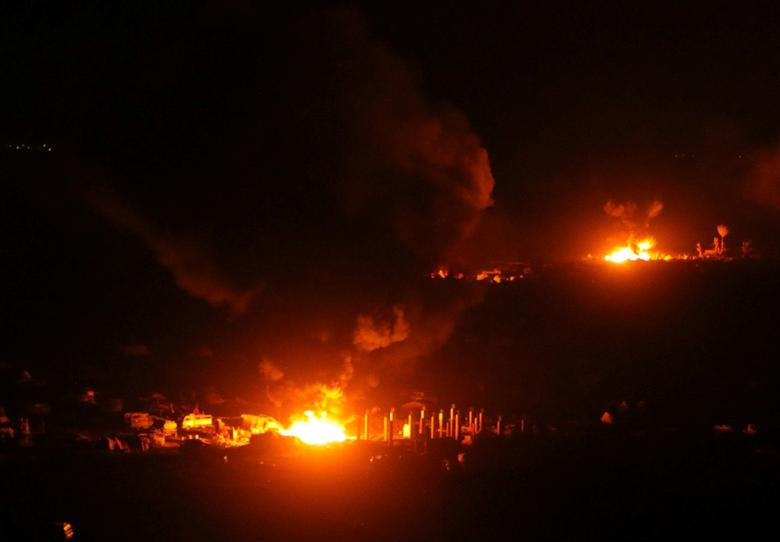 Khói lửa bốc lên tại ngôi làng Baghouz hôm 11/3.