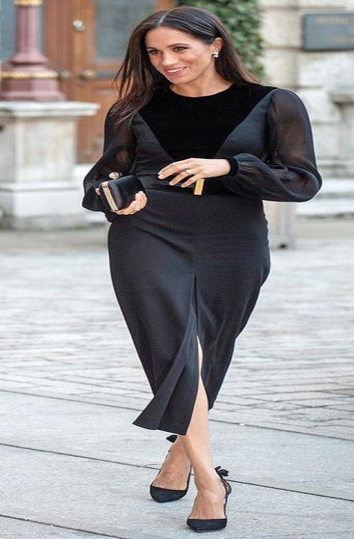 Nữ Công tước xứ Sussex tới dự sự kiện ở Học viện Nghệ thuật Hoàng gia, thủ đô London, ngày 25/9/2018.