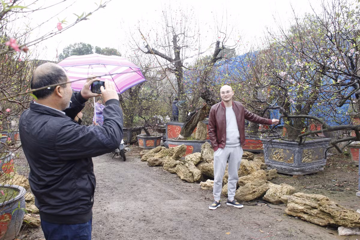 Anh: Nguoi dan trong dao Van Tao tat bat cho Tet Ky Hoi 2019-Hinh-10