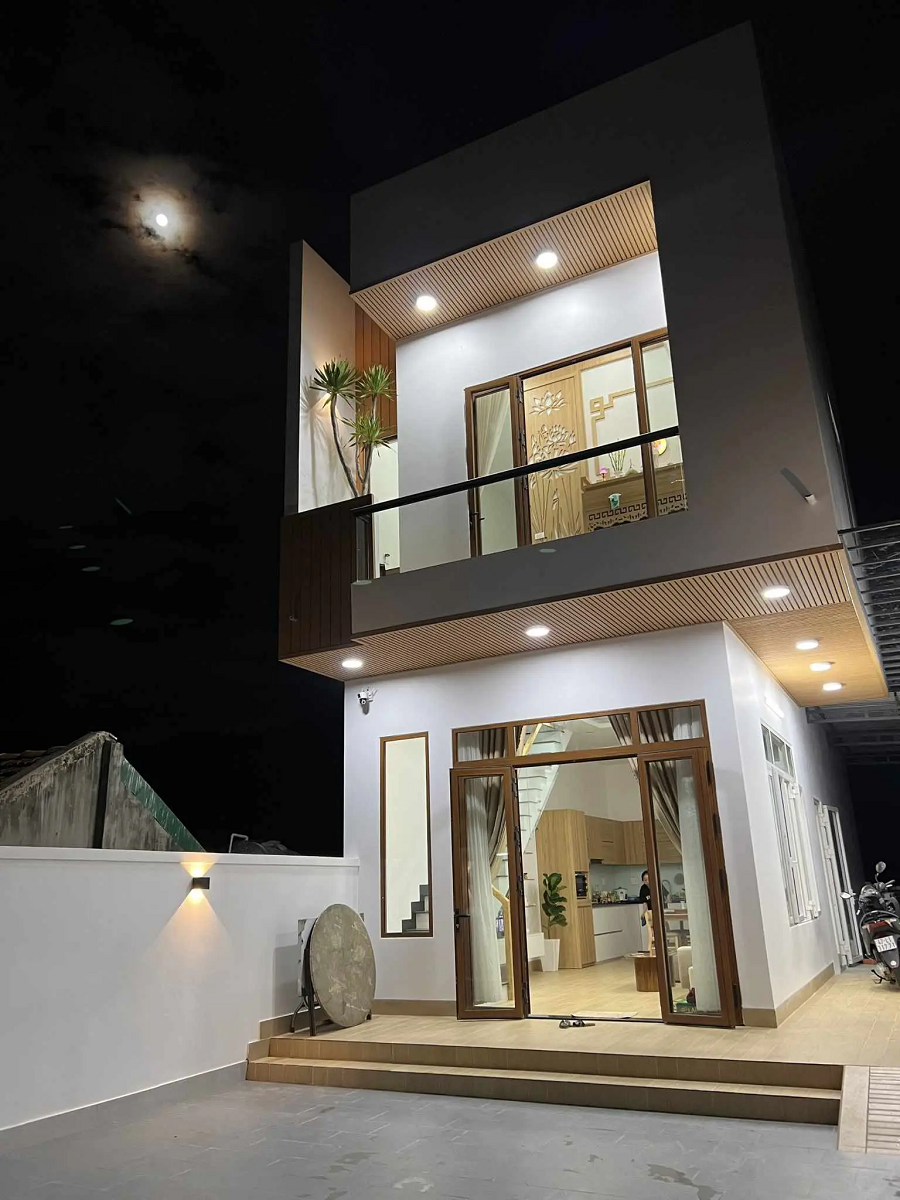 Căn nhà 2 tầng thiết kế tối giản nhưng góc nào cũng xinh - Hình 2 Can nha 2 tang thiet ke toi gian nhung goc nao cung xinh-Hinh-2