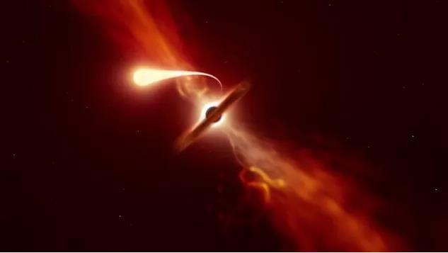  Vật thể có tên J221951 là một hiện tượng quang phổ sáng rực rỡ từ một lỗ đen khổng lồ cách Trái đất 10 tỉ năm ánh sáng.