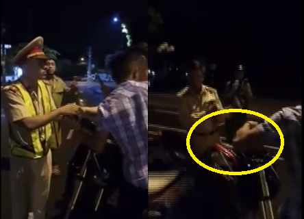 Thanh nien bi to thuc cui cho lam CSGT bi nga xuong duong noi gi?