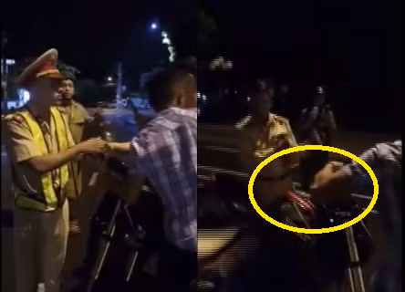 Thanh nien bi to thuc cui cho lam CSGT bi nga xuong duong noi gi?