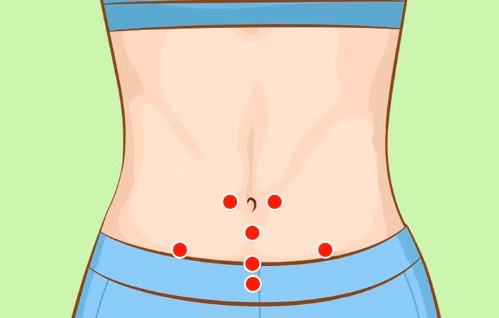 Sử dụng điểm nhấn bụng: Sử dụng ngón tay của bạn để bấm vào những điểm quanh bụng trên và trượt xuống một cách nhẹ nhàng. Ảnh: BS. Video "Bí quyết làm đẹp của sao Việt". Nguồn: VTC.