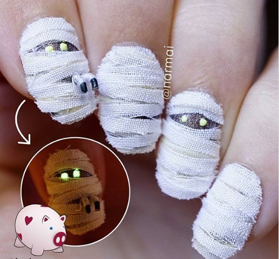 Với nhiều tạo hình đặc trưng của lễ hội Halloween như mạng nhện, đầu lâu, hàm răng, băng dán… bạn sẽ có được bộ móng vô cùng thú vị.