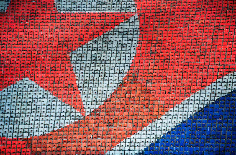 Lá Quốc kỳ Triều Tiên chuyển động được 30.000 trẻ em biểu diễn.