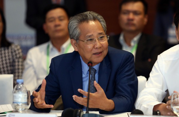 Chan dung 2 lanh dao chung khoan lot Top 10 doanh nhan tieu bieu 2022-Hinh-3