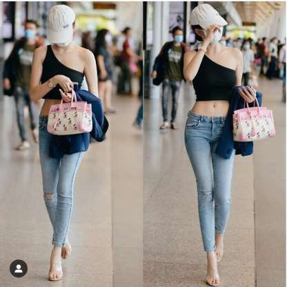 Thân hình nuột nà của Ngọc Trinh khi diện quần jeans kết hợp với chiếc áo đen kiểu dáng ôm sát đường cong khoe khéo vòng eo thon gọn.