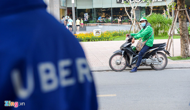 Grab mua lại Uber, nhưng từ chối thanh toán khoản nợ thuế 53 tỷ đồng mà Uber bỏ lại. Ảnh: Quỳnh Trang.