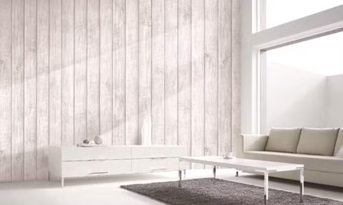 Màu của giấy dán tường tương đồng với nội thất biến cả căn phòng thành không gian đẳng cấp. Ảnh: Noithatbinhminh.