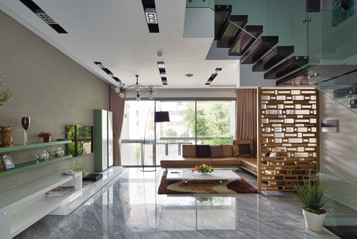 Phòng khách rộng thoáng nhờ thiết kế mở.