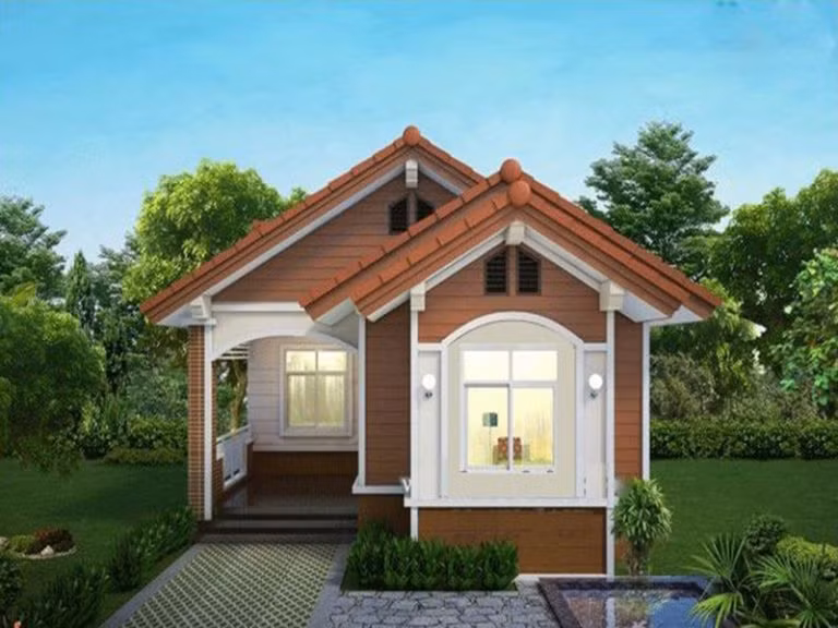 Căn nhà như một biệt thự vườn thu nhỏ đầy đủ tiện nghi. Bên ngoài được thiết kế cổ điển, tường lát gạch màu vân gỗ gần gũi. Ảnh: Tintuckientruc.