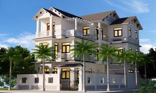 Biệt thự nằm trong khuôn viên rộng rãi với hàng dừa bao quanh. Ảnh: Kientrucadong.