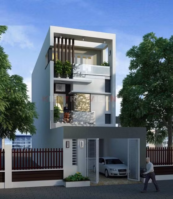 Nhà ống 2 tầng đẹp hiện đại này có sân để xe rộng rãi, cửa sắt màu trắng nổi bật. Ảnh: Kientrucnhaviet.