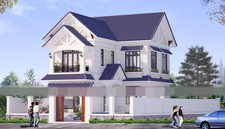 Nhà 2 tầng chữ L ở nông thôn được thiết kế theo lối kiến trúc hiện đại. Công trình nổi bật với mái thái dán ngói xanh mang nét quyến rũ, dịu dàng, thanh thoát. Ảnh: Kientrucmovie.