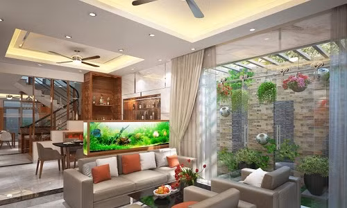 Để tạo không gian thoáng, sang trọng, nhóm kiến trúc sư Song Phát Construction đã kết hợp trần nhà cao với các khung cửa sổ kính.