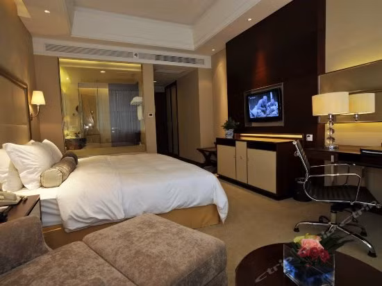 Mở cửa từ 2010, khách sạn 4 sao Mingdu International Hotel cao 12 tầng, bao gồm 201 phòng sang trọng. Ảnh: Ctrip.