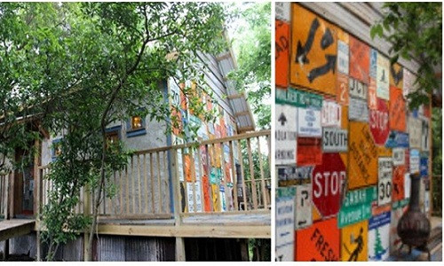 Tác giả của ngôi nhà sặc sỡ này đã kỳ công thu thập những biển báo giao thông bỏ đi để tạo thành bức tường đầy nghệ thuật. Ảnh: BI.