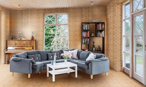 Mẫu gạch ốp tường phòng khách lấy cảm hứng từ lũy tre đồng bằng Bắc Bộ đem lại cảm giác thanh bình. Ảnh: Gachdongtam.