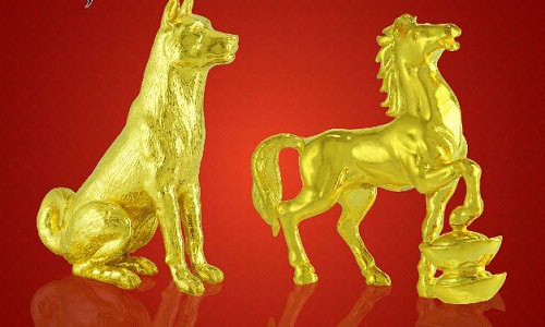 Vàng đúc nguyên khối hình chó với công nghệ chế tác tinh xảo. Ảnh: Doji.