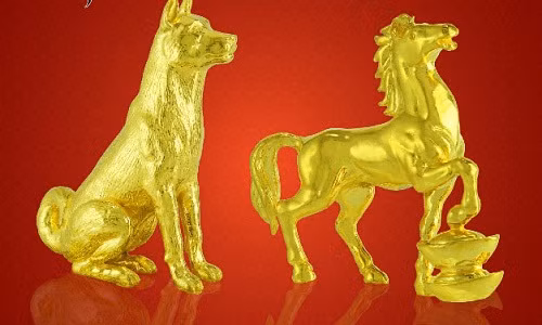 Vàng đúc nguyên khối hình chó với công nghệ chế tác tinh xảo. Ảnh: Doji.