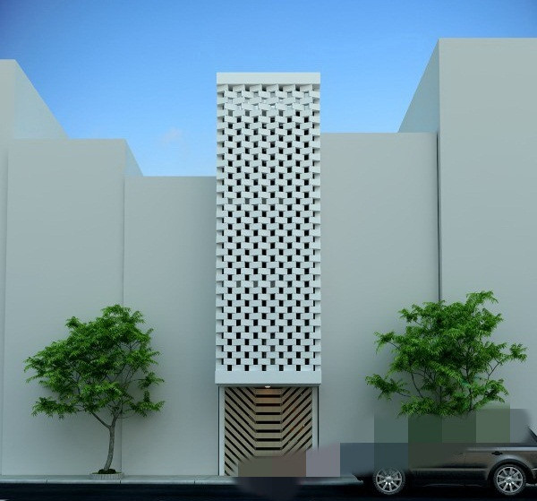 Mặt tiền ngôi nhà mang đậm tính hiện đại với những viên gạch bê tông nhẹ xếp chồng theo lớp tạo khoảng đặc rỗng thú vị. Ảnh: Noithattinhte.