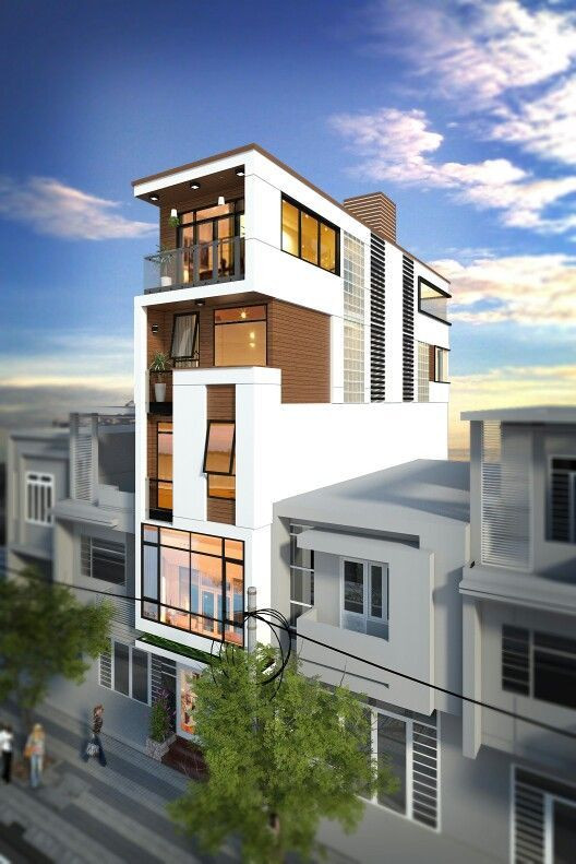 Thiết kế nhà ống lệch tầng với lối kiến trúc hiện đại nhẹ nhàng, thư thái. Ảnh: Song Phát Construction.